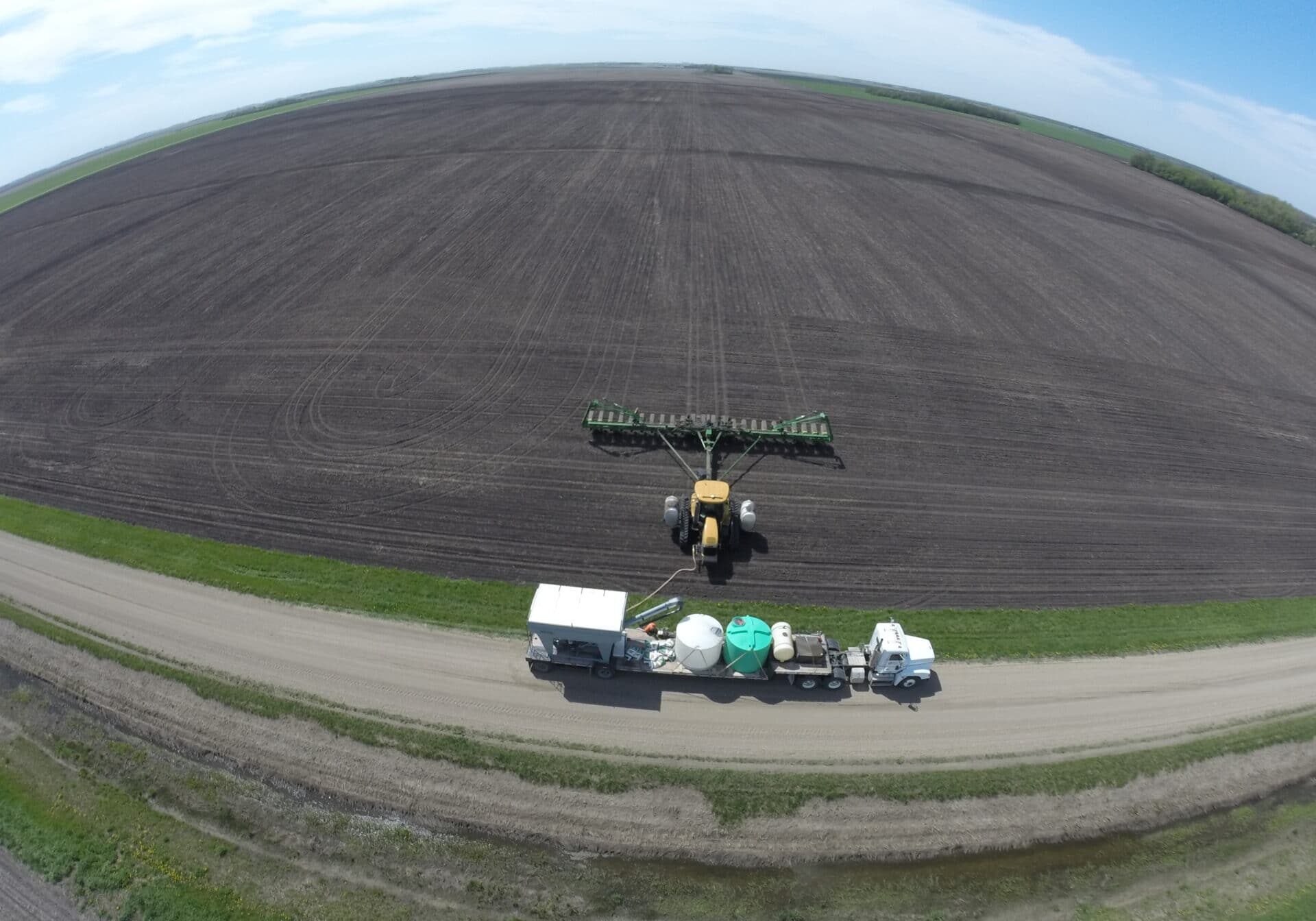Aerial View of Tractor and Truck with Fertilizer